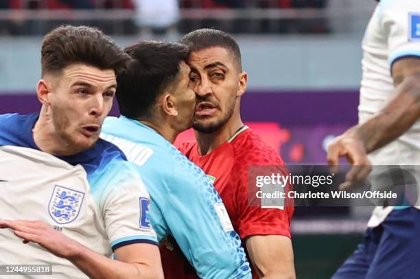 Iran goalkeeper Alireza Beiranvand collides with his teammate Majid Hosseini during the FIFA World Cup Qatar 2022 Group B match between England and...