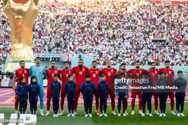 The Iran team LtR: Ehsan Hajsafi, Alireza Beiranvand, Morteza Pouraliganji, Rouzbeh Cheshmi, Ali Karimi, Majid Hosseini, Sadegh Moharrami, Ahmad...