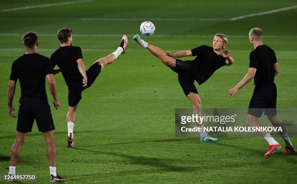 Denmark's forward Kasper Dolberg takes part in a training session at the al Sailiya SC Training Site in Doha on November 21 on the eve of the Qatar...