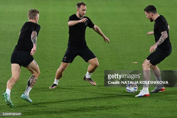 Denmark's midfielder Christian Eriksen takes part in a training session at the al Sailiya SC Training Site in Doha on November 21 on the eve of the...