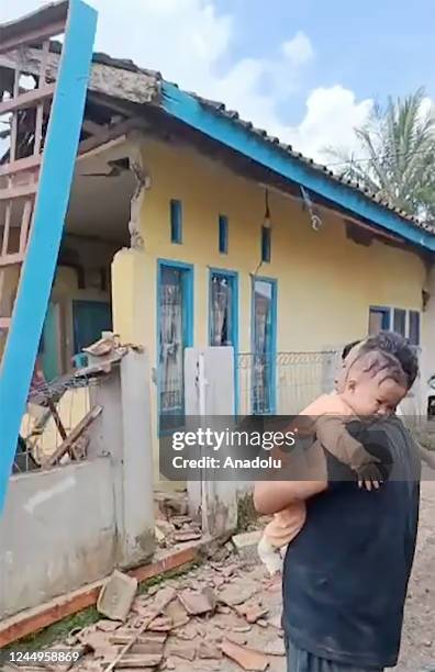 Screen grab from a video shows damage after 5.6 magnitude earthquake in Cianjur on November 21, 2022. - At least 56 people were killed in an...