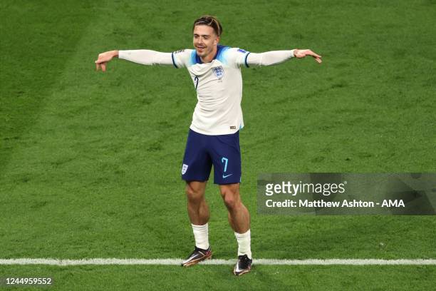 Jack Grealish of England celebrates after scoring a goal to make it 6-1 during the FIFA World Cup Qatar 2022 Group B match between England and IR...