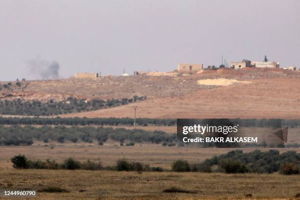 This picture taken on November 21, 2022 from a position in Jarablus in the northern part of Aleppo province, held by Turkey-backed Syrian forces,...