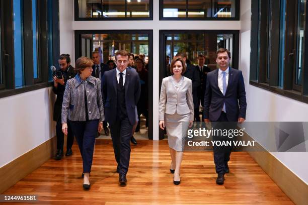 French President Emmanuel Macron arrives with French Foreign Minister Catherine Colonna , Moldovan President Maia Sandu and Moldovan Deputy Prime...