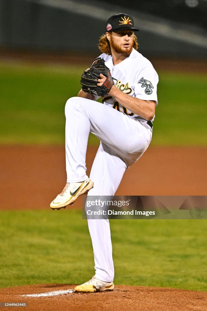 Colin Rafter Colin Peluse of the Mesa Solar Sox throws a pitch during a game... News ...