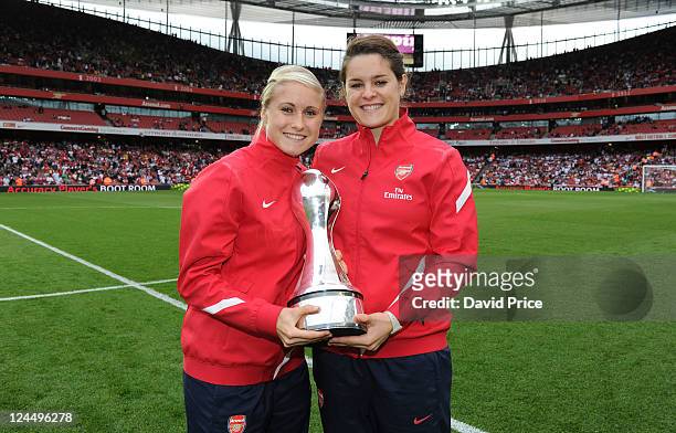 Steph Houghton and Jennifer Beattie of Arsenal Ladies with the WSL Trophy during the Barclays Premier League match between Arsenal and Swansea City...