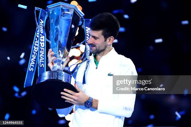 Novak Djokovic of Serbia poses with the trophy at the end of the final singles match between Novak Djokovic of Serbia and Casper Ruud of Norway...