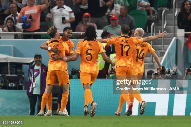 Cody Gakpo of Netherlands celebrates with his team mates after scoring a goal to make it 0-1 during the FIFA World Cup Qatar 2022 Group A match...