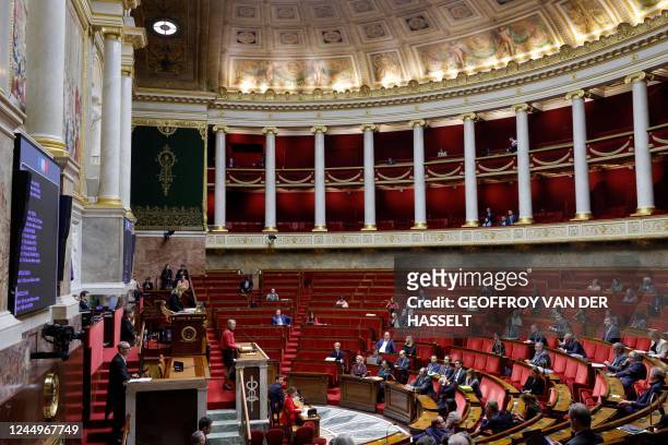 French Prime Minister Elisabeth Borne announces the use of clause 49-3 of the French constitution before the National Assembly, French Parliament...