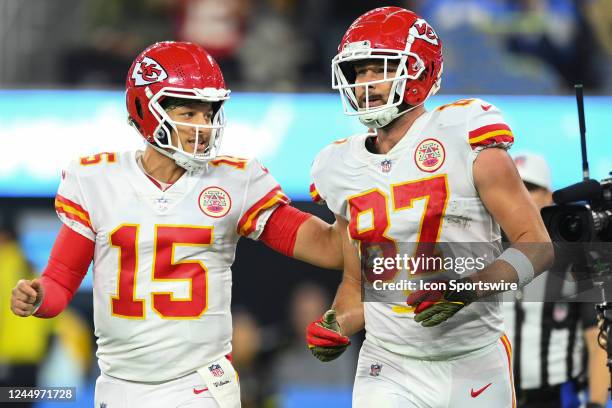 Kansas City Chiefs quarterback Patrick Mahomes celebrates with tight end Travis Kelce after a touchdown during the NFL regular season game between...