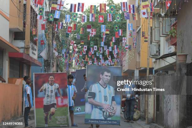 Members of Argentina fan Club with players poster celebrate day before Argentina's first play in Qatar World Cup 2022 on November 21, 2022 in...