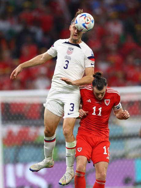 Walker Zimmerman of USA in action against Gareth Bale of Wales during the FIFA World Cup Qatar 2022 Group B match between USA and Wales at Ahmed bin...