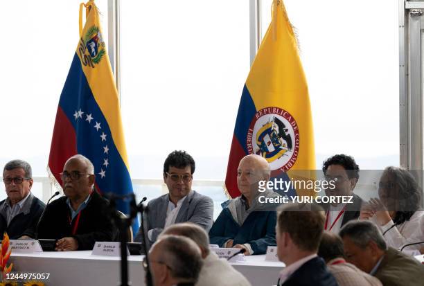 Colombia's National Liberation Army guerrilla Commander Pablo Beltran, Venezuela's representative Carlos Martinez, and the Colombian government...