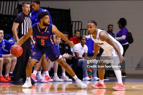 Bucknell Bison guard Elvin Edmonds IV dribbles during the game between the Bucknell Bison and the Presbyterian Blue Hose in the Sunshine Slam on...