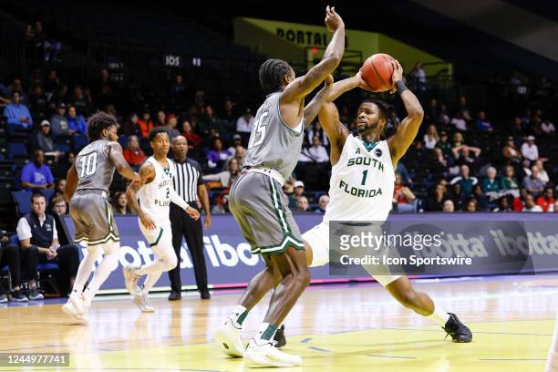 South Florida Bulls guard Selton Miguel is guarded by UAB Blazers forward Ty Brewer during the game between the UAB Blazers and the South Florida...