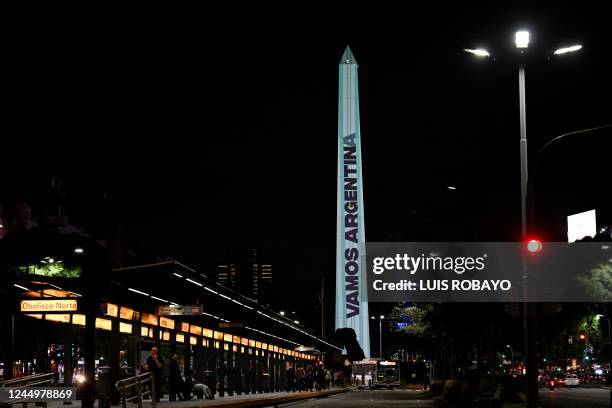 Projection mapping shows the national flag and a sign reading: "Go Argentina!" on the Obelisk in Buenos Aires, Argentina on November 21 on the eve of...