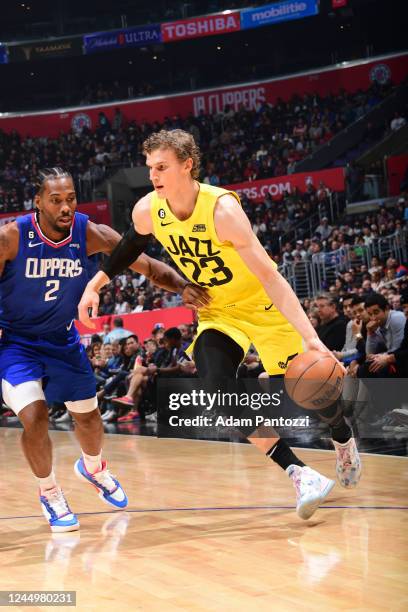 Lauri Markkanen of the Utah Jazz dribbles the ball during the game against the LA Clippers on November 21, 2022 at Crypto.Com Arena in Los Angeles,...