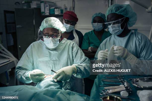 Staff of the International Committee of the Red Cross surgical unit in Goma, eastern Democratic Republic of Congo, on November 19, 2022 performs a...
