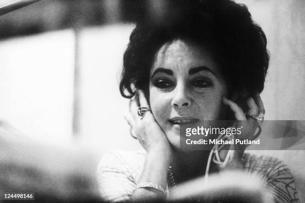 British-born actress Elizabeth Taylor in a studio to record Stephen Sondheim's songs for the film 'A Little Night Music', directed by Harold Prince,...