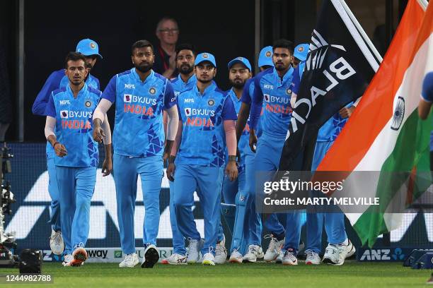 Indias captain Hardik Pandya leads his team onto the field during the third Twenty20 cricket match between New Zealand and India at McLean Park in...