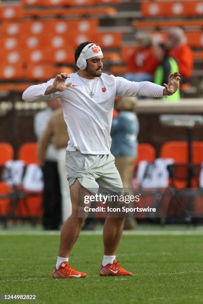 Clemson Tigers running back Will Shipley practices some tai chi moves prior to warm us during a college football game between the Miami Hurricanes...
