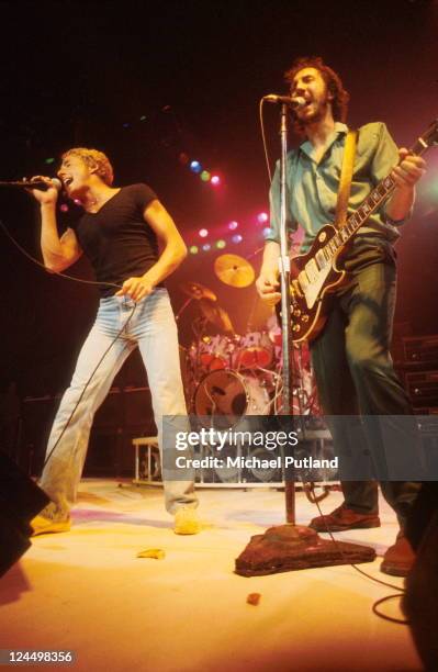 Roger Daltrey and Pete Townshend of The Who perform on stage, USA, September 1979. Townshend plays his Gibson Les Paul Deluxe guitar number 1.