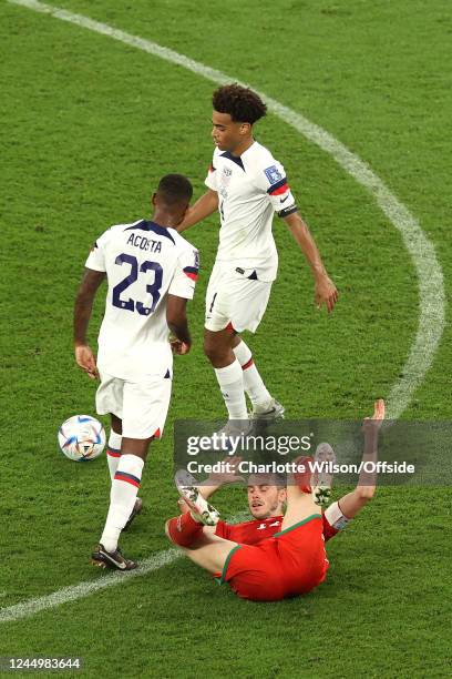 Gareth Bale of Wales on the floor after being fouled by Kellyn Acosta of USA during the FIFA World Cup Qatar 2022 Group B match between USA and Wales...