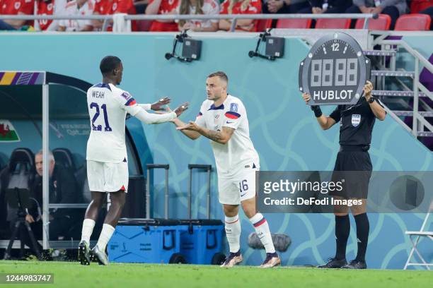 Timothy Weah of USA and Jordan Morris of USA substitutes during the FIFA World Cup Qatar 2022 Group B match between USA and Wales at Ahmad Bin Ali...