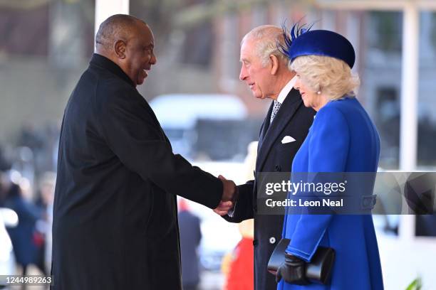 President of South Africa Cyril Ramaphosa shakes hands with King Charles III and Camilla, Queen Consort of the United Kingdom during his welcome...