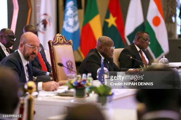 Ghana's President Nana Akufo-Addo , flanked by European Council President Charles Michel , chairs the Accra Initiative summit on West Africa...