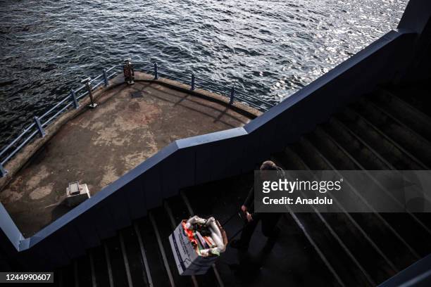 Man walks down the stairs after the rain in Istanbul, Turkiye on November 22, 2022.