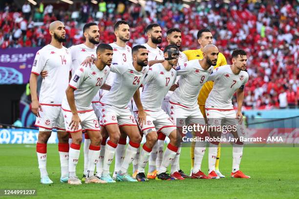 The Tunisia National Football Team pose for a team photo during the FIFA World Cup Qatar 2022 Group D match between Denmark and Tunisia at Education...