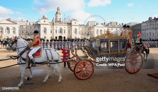 Britain's King Charles III and Camilla, the Queen Consort travel with the President of South Africa Cyril Ramaphosa in a carriage after a ceremonial...