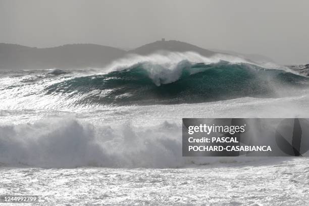 Picture taken on November 22, 2022 from Albitreccia shows big waves as storm Denise hits the French Mediterranean island of Corsica.