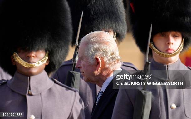 Britain's King Charles III inspect a Guard of Honour, formed by Number 7 Company Coldstream Guards, during a Ceremonial Welcome on Horse Guards...