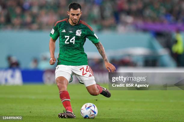 Luis Chavez of Mexico passes the ball during the Group C - FIFA World Cup Qatar 2022 match between Mexico and Poland at Stadium 974 on November 22,...