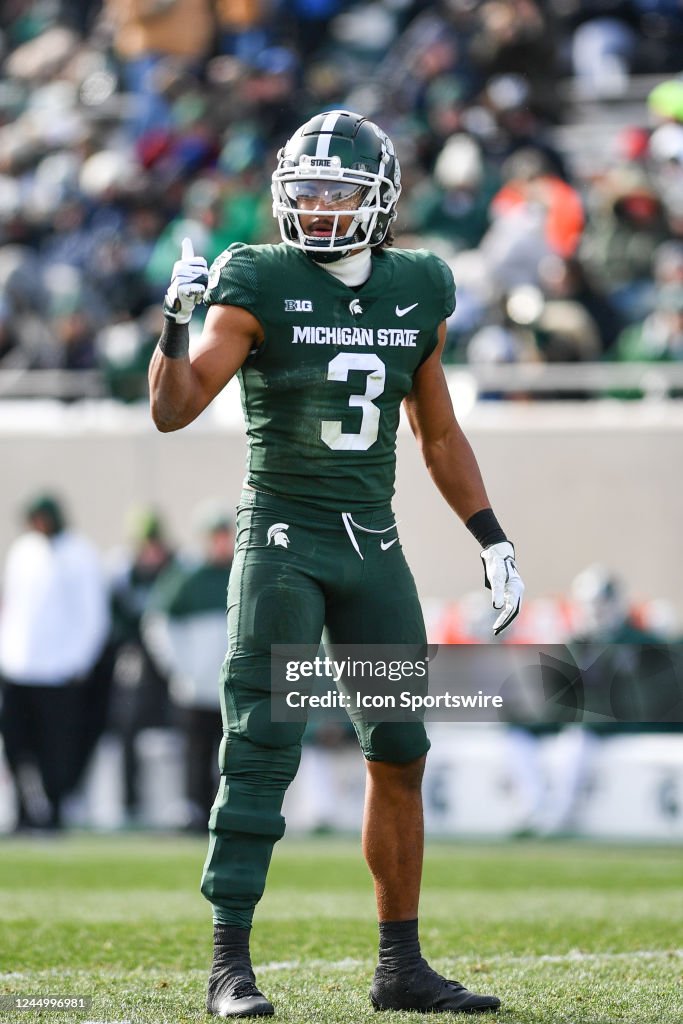 Adam Ruff Michigan State Spartans safety Xavier Henderson communicates with his ...