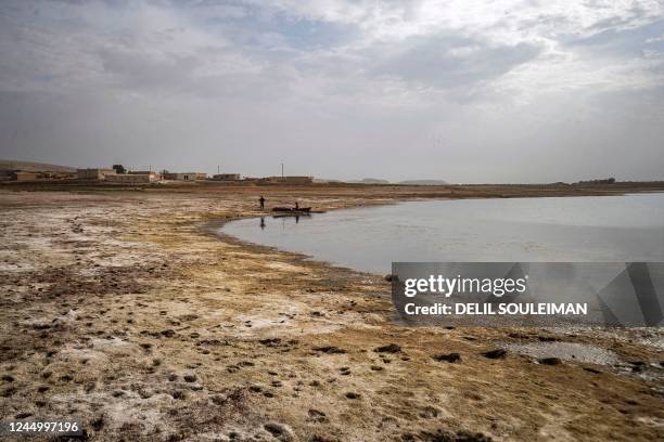 Picture shows drought and low water levels in the Euphrates River in the western countryside of Tabqa in Syria's Raqqa governorate, on November 22,...