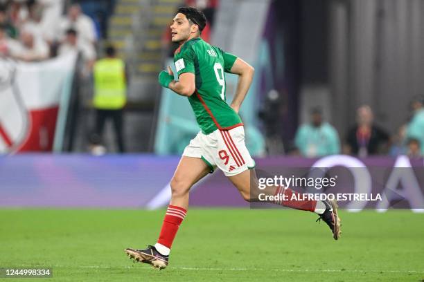 Mexico's forward Raul Jimenez enters the pitch during the Qatar 2022 World Cup Group C football match between Mexico and Poland at Stadium 974 in...