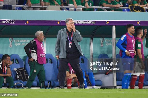 Coach Gerardo Martino of Mexico looks on during the Group C - FIFA World Cup Qatar 2022 match between Mexico and Poland at Stadium 974 on November...