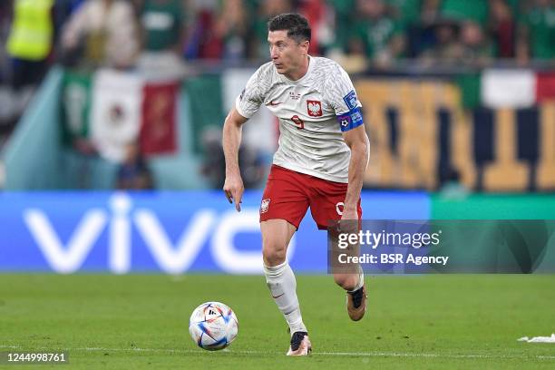 Robert Lewandowski of Poland runs with the ball during the Group C - FIFA World Cup Qatar 2022 match between Mexico and Poland at Stadium 974 on...