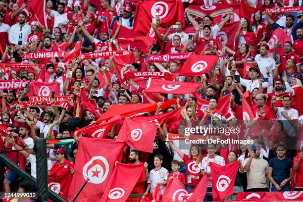 Fans of Tunisia with flags,banner prior to the FIFA World Cup Qatar 2022 Group D match between Denmark and Tunisia at Education City Stadium on...