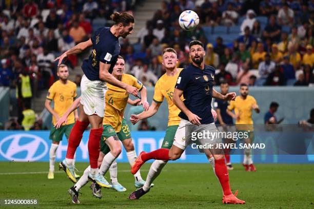 France's midfielder Adrien Rabiot scores during the Qatar 2022 World Cup Group D football match between France and Australia at the Al-Janoub Stadium...