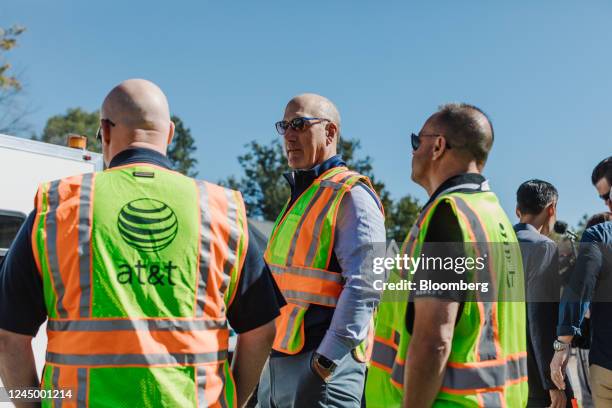 John Stankey, chief executive officer of AT&T Inc., center, meets with fiber optic workers at a job site in Evansville, Indiana, US, on Wednesday,...