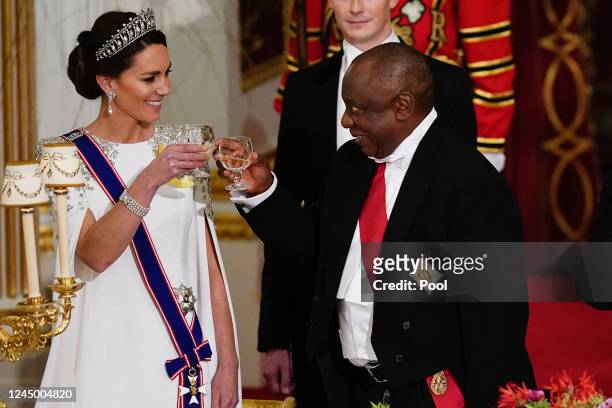Catherine, Princess of Wales and President Cyril Ramaphosa of South Africa share a toast during the State Banquet at Buckingham Palace during the...