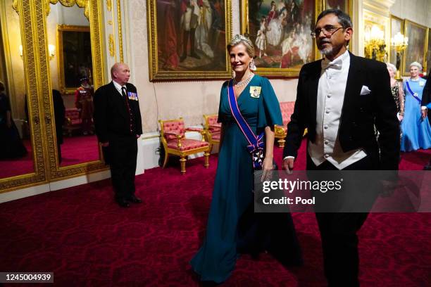 The Countess of Wessex with a guest during the State Banquet at Buckingham Palace on November 22, 2022 in London, England. This is the first state...
