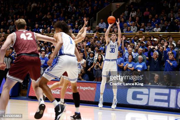 Kyle Filipowski of the Duke Blue Devils puts up a three-point shot against the Bellarmine Knights at Cameron Indoor Stadium on November 21, 2022 in...