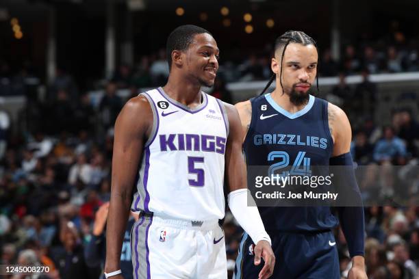 De'Aaron Fox of the Sacramento Kings and Dillon Brooks of the Memphis Grizzlies look on during the game on November 22, 2022 at FedExForum in...
