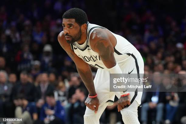 Kyrie Irving of the Brooklyn Nets looks on against the Philadelphia 76ers in the second quarter of the game at the Wells Fargo Center on November 22,...