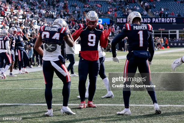 New England Patriots wide receiver Kendrick Bourne , outside linebacker Matt Judon and wide receiver DeVante Parker dance in warm up before a game...